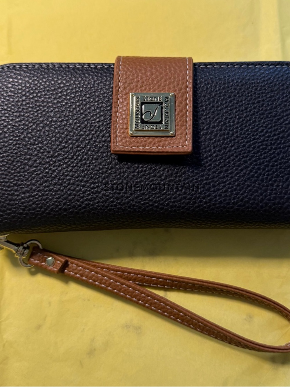 Stone Mountain Black Pebbled Wristlet with Brown Accent